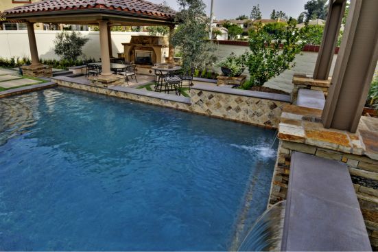 Conscious Environments captures the clean and classic style of this backyard pool/landscaping project with the use of a natural color palette.