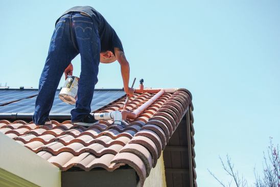 12) The PVC pipes are painted to match the color of the roof. The pipes on the side of the house were similarly painted the color of the stucco. The crew had an uncanny ability to mix paint shades from a few basic colors they carried in their truck.