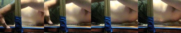 These video captures show Steve Barnes

trapping off on a compliant 12-by-12-inch drain cover to study body

entrapment. By pushing himself down, Barnes was able to apply 95.8

lbs. of downward force onto the grate. He was able to release with

5.6 lbs of force. Tests such as this have confirmed that skin

behaves similarly to the body-blocking element; it is slightly more

likely to adhere to the cover and also easier to remove. Some

standard writers hope to find a closer match to human

skin.